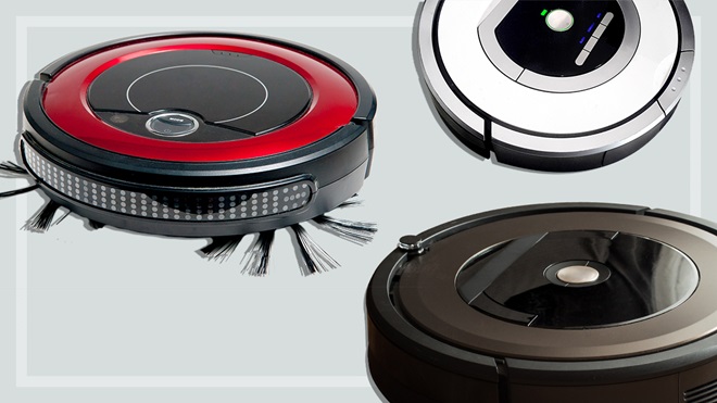 three robot vacuum cleaners on a light grey background